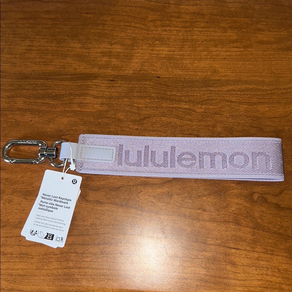 lululemon Never Lost metallic wordmark lavender Keychain NWT
